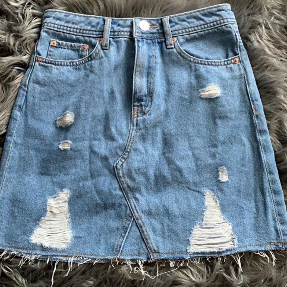 Ripped denim skirt